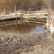 Separate area from main channel for watering.